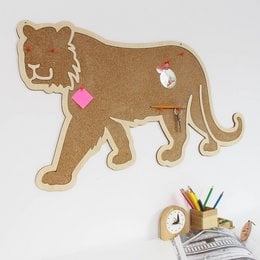 Cork board with a tiger design, suitable for wall art or office decor. Features a brown tiger shape with pink accents and a small circular design element.