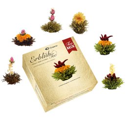 Blooming tea set with a variety of colorful tea flowers in a glass teapot. The set includes white, green, and black tea flowers that bloom when steeped in hot water, creating a visually stunning and aromatic tea experience.