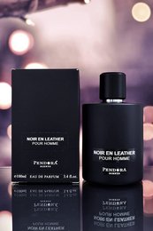 Noir en Leather 100 ML perfume by Pendora. A masculine fragrance with notes of leather, wood, and spice. Sleek black bottle design.