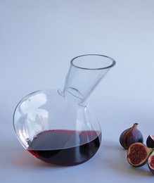  Clear glass wine decanter, curved modern shape, tall spout, elegant pour spout design