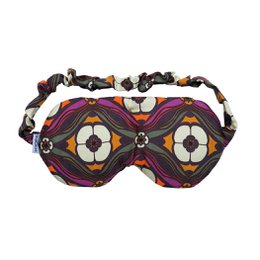 A colorful, patterned eye mask with floral designs and a bohemian style. The mask is made of soft, comfortable material and is designed for relaxation and sleep.