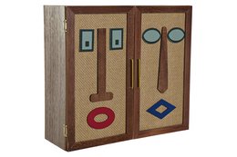 Rectangular brown wooden storage box with geometric patterns and shapes on the doors.