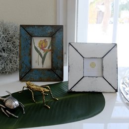 Vintage-style blue photo frame with antique finish, suitable for displaying 4x6 inch photos. Crafted with a distressed, weathered appearance for a rustic, timeless look.