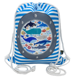  A blue and white striped drawstring backpack with a clear window displaying an underwater scene with various marine life.