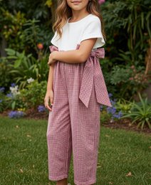  White short-sleeved top, pink gingham jumpsuit with bow detail, suitable for girls aged 2-10 years.
