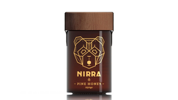 Raw, unprocessed pine honey in a glass jar with a brown label featuring a bear logo. The honey is a natural, pure product from the Nirra brand.