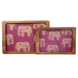 Set of 2 wooden trays with a repeating pattern of ornate elephant designs in white on a burgundy background. The trays have a rustic, handcrafted appearance and are suitable for serving food or decorative display.