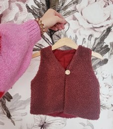 Ecru floral waistcoat, a kids' cardigan with a soft, fuzzy texture and a floral pattern in shades of brown and beige. The waistcoat features a button closure and is available in sizes 74/80 to 122/128.