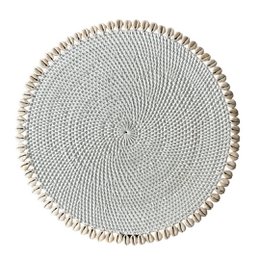 Round woven placemat in neutral colors of beige, black, and white. Textured circular design with fringe border.