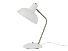 A white table lamp with a curved arm and a round, dome-shaped shade. The lamp has a simple, minimalist design and appears to be made of metal.