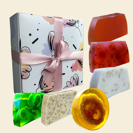  Colorful artisan glycerin soap bars, red amber white green, floral patterns, natural ingredients, gift set packaging with ribbon.