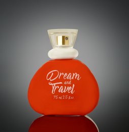 Dream and Travel eau de parfum for women, 75ml, floral, fruity fragrance in a red and white bottle.