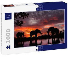Elephants silhouetted against a vibrant sunset sky, reflected in a river. A 1000-piece jigsaw puzzle depicting a serene African landscape.