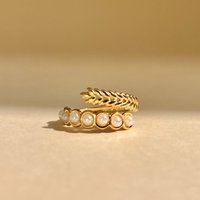 Adjustable leaf and adjustable steel pearl ring