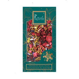 Premium dark chocolate bar with raspberries and edible flowers, handmade in Austria.