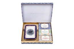  A set of 3 decorative soaps in a patterned box, featuring a blue and white floral design.