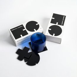 Set of 6 black and white geometric coasters featuring Malevich-inspired designs. Circular, square, and cross shapes in a minimalist, abstract style. Durable and stylish coasters for modern home decor.