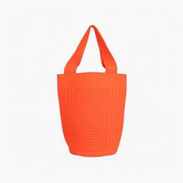  Neon orange striped round tote bag made of durable material, suitable for everyday use.