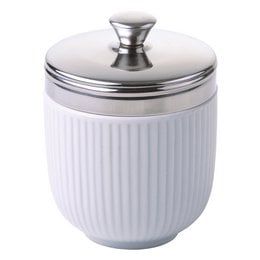 A white ceramic egg coddler with a fluted design and a silver metal lid.