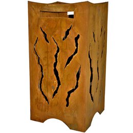 Rustic metal fire barrel with flame-inspired cutouts, suitable for outdoor garden decoration and fire pit use.