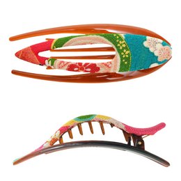 Small claw hair clip made of colorful kimono fabric with floral and geometric patterns.