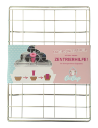 A metal wire rack with a pink and white graphic design featuring baking tools and the text "Zentrierhilfe" (centering aid).