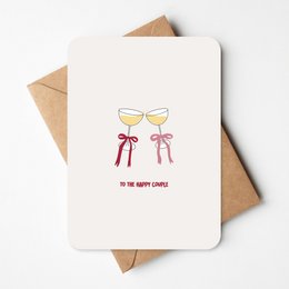 "Elegant wedding card with champagne glasses and red bows. Suitable for newlyweds or anniversary celebrations."