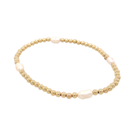  This gold ball bracelet with pearls is a stylish and elegant accessory. It features a string of gold-filled beads interspersed with small pearls, creating a beautiful and delicate design. The bracelet has a classic and timeless look that can be worn for any occasion.