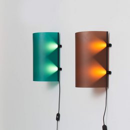  Chocolate brown and green table lamps with warm lighting, designed by Studio Ilse Bouwens.