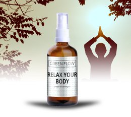  A 100ml bottle of Relax Your Body shower aroma with a light green and white label. The bottle is surrounded by nature elements like leaves and branches.