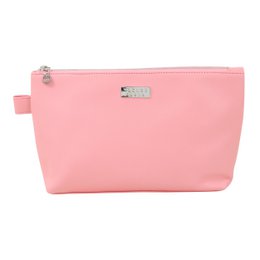 Large coral-colored toiletry bag with premium luxe design.