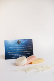 Solid shampoo bar for hotels, made with natural ingredients. Bar-shaped, with a light yellow and white color.
