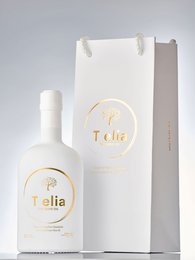 Ultra premium extra virgin olive oil in a gift bag. Telia brand, with a minimalist white and gold design.