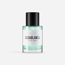 Casablanca eau de parfum, a floral and woody fragrance with notes of jasmine, rose, and sandalwood, presented in a sleek black bottle.