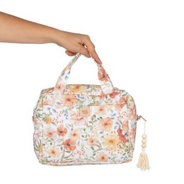 Large floral print makeup bag with tassel detail.