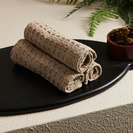 Clay beige waffle weave cotton bamboo face towel, soft absorbent rolled towel.