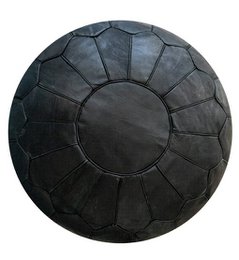  Large black leather pouffe with a round, patterned design. Suitable for use as a kids chair or ottoman.