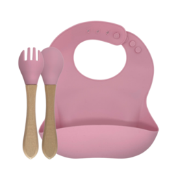 A pink silicone bib with bamboo cutlery, suitable for babies and toddlers. The bib is made of soft, durable silicone and the cutlery set includes a fork and spoon.