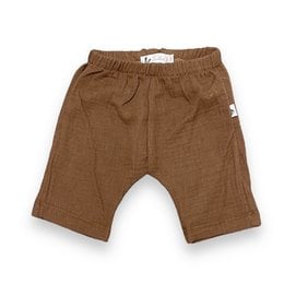 Brown baby pants with elastic waistband, suitable for infants and toddlers. Made of soft, breathable material for comfort.