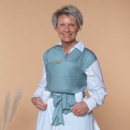 Soft, cozy swaddle wrap in a light blue color with a simple, elegant design. Made from high-quality, breathable fabric for comfortable baby snuggling.