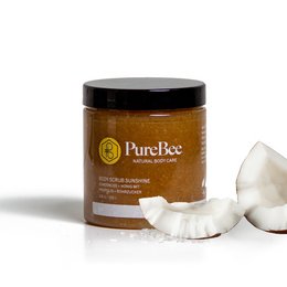 A coconut-based body scrub with a natural, tropical scent. The scrub contains coconut oil and sugar to gently exfoliate and nourish the skin.