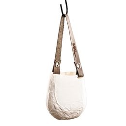 Fold wind light hanging, a round, tall candle holder made of beige fabric material with a hanging design.