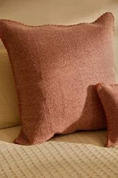Brown cotton dhurrie square cushion cover, textured weave, minimalist design, available in multiple sizes.