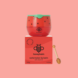  Red watermelon-shaped lip balm with green leaf top, natural moisturizing balm, cute fruit design.