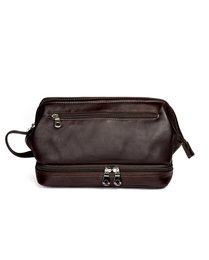 A small, rectangular makeup pouch in black, brown, or cognac colors. The pouch has a zipper closure and multiple compartments for storing cosmetics and toiletries.