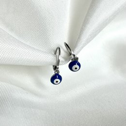 Blue evil eye hoop earrings with a dark blue eye charm.
