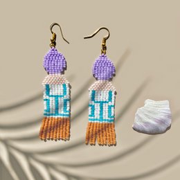  Handmade square-shaped earrings with intricate beadwork in shades of pink, red, and blue. The earrings feature a unique and eye-catching design that makes them a statement piece.