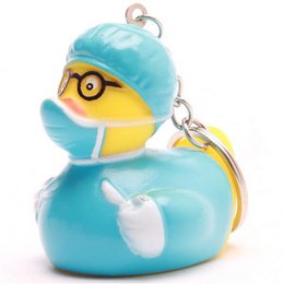  Turquoise rubber duck with a wave pattern design, suitable for use in a child's bath.