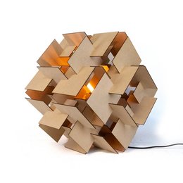A modern, geometric hanging lamp or floor lamp made of wood in various sizes and colors, including black, beige, and light wood.
The Quadrata hanging lamp or floor lamp features a geometric, cubist design made of wood. It comes in multiple sizes ranging from 30 cm to 58 cm, and in several color options including black, beige, and light wood. The lamp has a warm, ambient glow when lit, creating a modern and stylish lighting solution for any space.