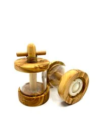 Olive wood herb mill with glass container and wooden grinder for grinding and storing herbs and spices.